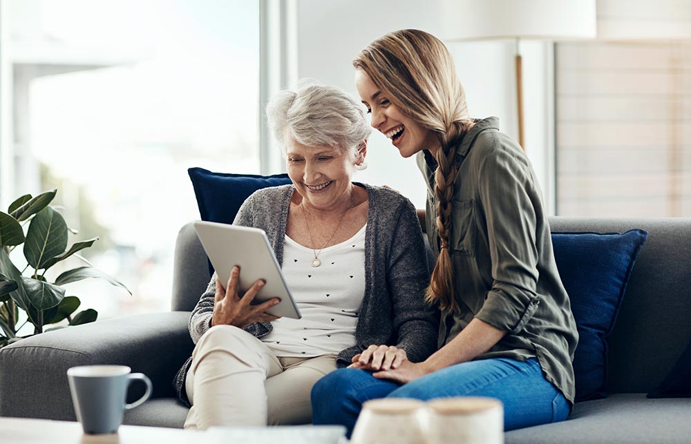 Woman Looking at a Tablet Computer